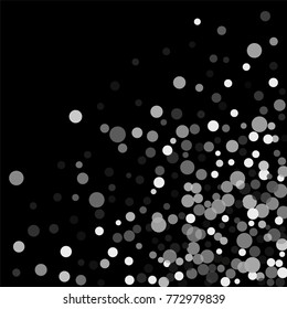 Silver confetti on a black background. Luxury festive background. Silver translucent abstract dots are scattered on a black background. Element of design. Vector illustration, EPS 10.
