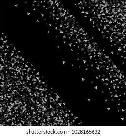 Silver confetti triangle on a black background. Abstract celebration background in the form of a silver triangle. Decorative element. Suitable for your design, cards, invitations, gifts.