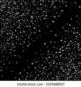 Silver confetti triangle on a black background. Abstract celebration background in the form of a silver triangle. Decorative element. Suitable for your design, cards, invitations, gifts.