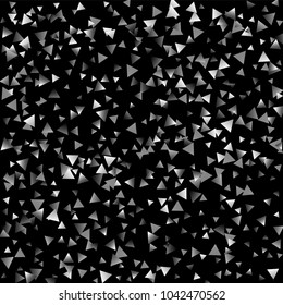 Silver confetti triangle on a black background. Abstract celebration background in the form of a silver triangle. Decorative element. Suitable for your design, cards, invitations, gifts.