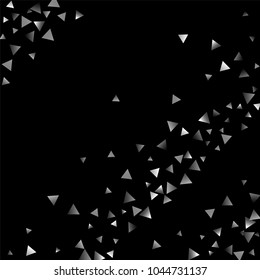 Silver confetti triangle on a black background. Abstract celebration background in the form of a silver triangle. Decorative element. Suitable for your design, cards, invitations, gifts.
