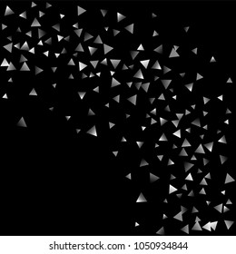 Silver confetti triangle on a black background. Abstract celebration background in the form of a silver triangle. Decorative element. Suitable for your design, cards, invitations, gifts.