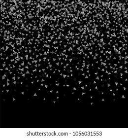 Silver confetti triangle on a black background. Abstract celebration background in the form of a silver triangle. Decorative element. Suitable for your design, cards, invitations, gifts.