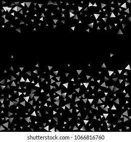 Silver confetti triangle on a black background. Abstract celebration background in the form of a silver triangle. Decorative element. Suitable for your design, cards, invitations, gifts.