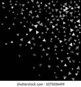 Silver confetti triangle on a black background. Abstract celebration background in the form of a silver triangle. Decorative element. Suitable for your design, cards, invitations, gifts.