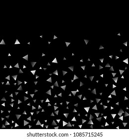Silver confetti triangle on a black background. Abstract celebration background in the form of a silver triangle. Decorative element. Suitable for your design, cards, invitations, gifts.