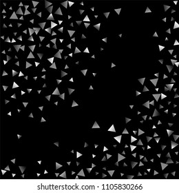 Silver confetti triangle on a black background. Abstract celebration background in the form of a silver triangle. Decorative element. Suitable for your design, cards, invitations, gifts.