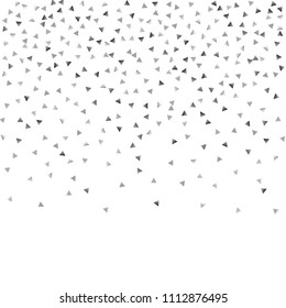 Silver confetti triangle on a white background. Abstract celebration background in the form of a silver triangle. Decorative element. Suitable for your design, cards, invitations, gifts.