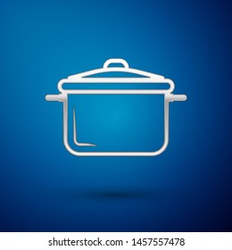 Silver Cooking pot icon isolated on blue background. Boil or stew food symbol.  Vector Illustration