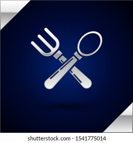 Silver Crossed fork and spoon icon isolated on dark blue background. Cooking utensil. Cutlery sign.  Vector Illustration