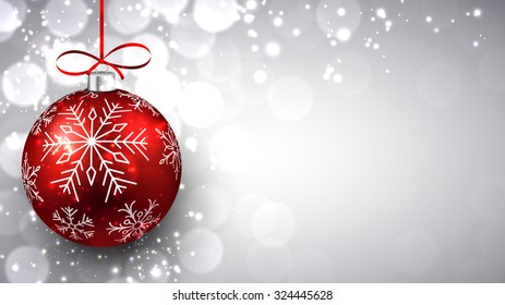 Silver defocused background with red christmas bauble and place for text. Vector. 