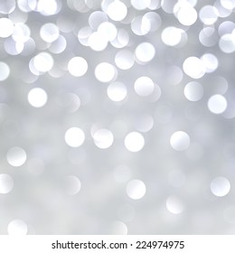 Silver defocused christmas background. Bright bokeh. Vector illustration.