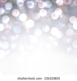 Silver defocused christmas background. Bright bokeh. Vector illustration.
