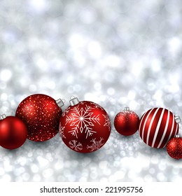 Silver defocused with red christmas balls background. Bright bokeh. Vector illustration.