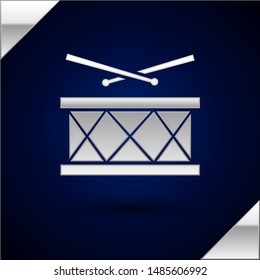 Silver Drum with drum sticks icon isolated on dark blue background. Music sign. Musical instrument symbol.  Vector Illustration