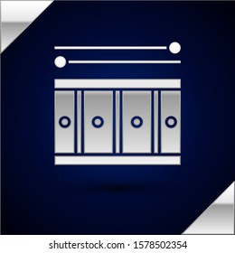Silver Drum with drum sticks icon isolated on dark blue background. Music sign. Musical instrument symbol.  Vector Illustration