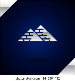 Silver Egypt pyramids icon isolated on dark blue background. Symbol of ancient Egypt.  Vector Illustration
