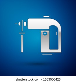 Silver Electric rotary hammer drill machine icon isolated on blue background. Working tool for construction, finishing, repair work.  Vector Illustration