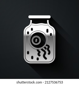 Silver Eye in a jar icon isolated on black background. Happy Halloween party. Long shadow style. Vector