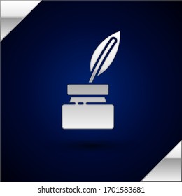 Silver Feather and inkwell icon isolated on dark blue background.  Vector Illustration