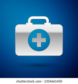 Silver First aid kit icon isolated on blue background. Medical box with cross. Medical equipment for emergency. Healthcare concept. Vector Illustration