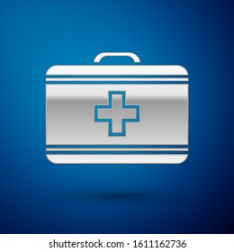 Silver First aid kit icon isolated on blue background. Medical box with cross. Medical equipment for emergency. Healthcare concept.  Vector Illustration