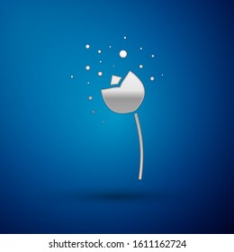 Silver Flower producing pollen in atmosphere icon isolated on blue background.  Vector Illustration