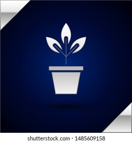 Silver Flowers in pot icon isolated on dark blue background. Plant growing in a pot. Potted plant sign.  Vector Illustration