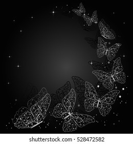 Silver flying butterflies on dark background with place for your text.