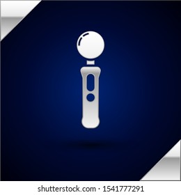 Silver Gamepad icon isolated on dark blue background. Game controller.  Vector Illustration