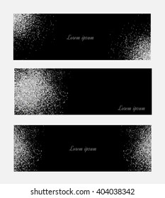 Silver glitter background.  Silver sparkles on black background