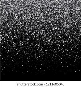 Silver glitters on a black background. Abstract vector background.