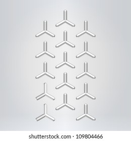 Silver glossy abstract tyres background hanging over light neutral background