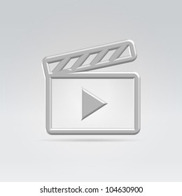 Silver glossy computer icon metaphor for video hanging in space