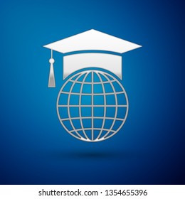 Silver Graduation cap on globe icon isolated on blue background. World education symbol. Online learning or e-learning concept. Vector Illustration