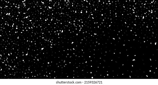 Silver grainy abstract texture overflows against a black background. Element of design.