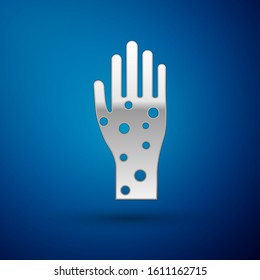 Silver Hand with psoriasis or eczema icon isolated on blue background. Concept of human skin response to allergen or chronic body problem.  Vector Illustration