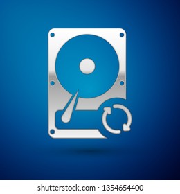 Silver Hard disk drive (HDD) sync refresh icon isolated on blue background. Vector Illustration