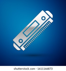 Silver Harmonica icon isolated on blue background. Musical instrument.  Vector Illustration