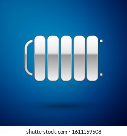 Silver Heating radiator icon isolated on blue background.  Vector Illustration