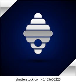 Silver Hive for bees icon isolated on dark blue background. Beehive symbol. Apiary and beekeeping. Sweet natural food.  Vector Illustration