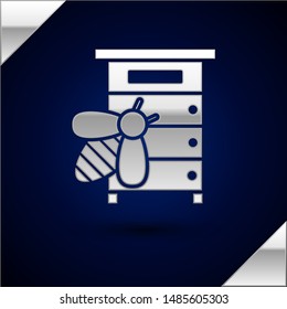 Silver Hive for bees icon isolated on dark blue background. Beehive symbol. Apiary and beekeeping. Sweet natural food.  Vector Illustration