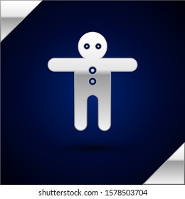 Silver Holiday gingerbread man cookie icon isolated on dark blue background. Cookie in shape of man with icing.  Vector Illustration