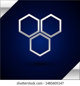 Silver Honeycomb icon isolated on dark blue background. Honey cells symbol. Sweet natural food.  Vector Illustration