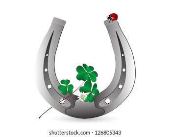 Silver horseshoe with ladybird and clover leaves