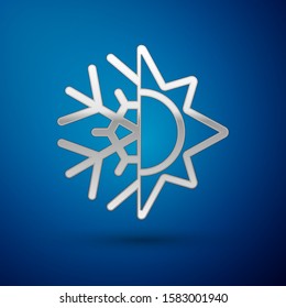 Silver Hot and cold symbol. Sun and snowflake icon isolated on blue background. Winter and summer symbol.  Vector Illustration