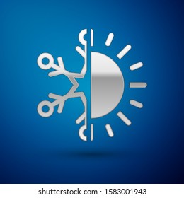 Silver Hot and cold symbol. Sun and snowflake icon isolated on blue background. Winter and summer symbol.  Vector Illustration