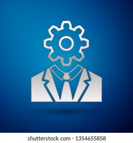 Silver Human head with gear inside icon isolated on blue background. Artificial intelligence. Thinking brain sign. Symbol work of brain. Vector Illustration