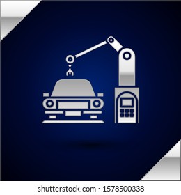 Silver Industrial machine robotic robot arm hand on car factory icon isolated on dark blue background. Industrial automation production automobile.  Vector Illustration
