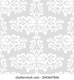 Silver islamic oranment seamless pattern. Decorative texture oriental ornament damask. Vintage background. Silver, gray and white color. For fabric, wallpaper, venetian pattern,textile, packaging.